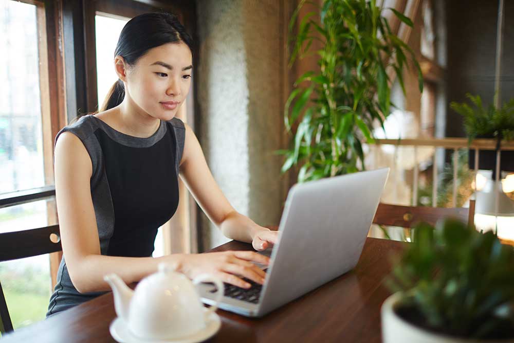 A professional women using her laptop